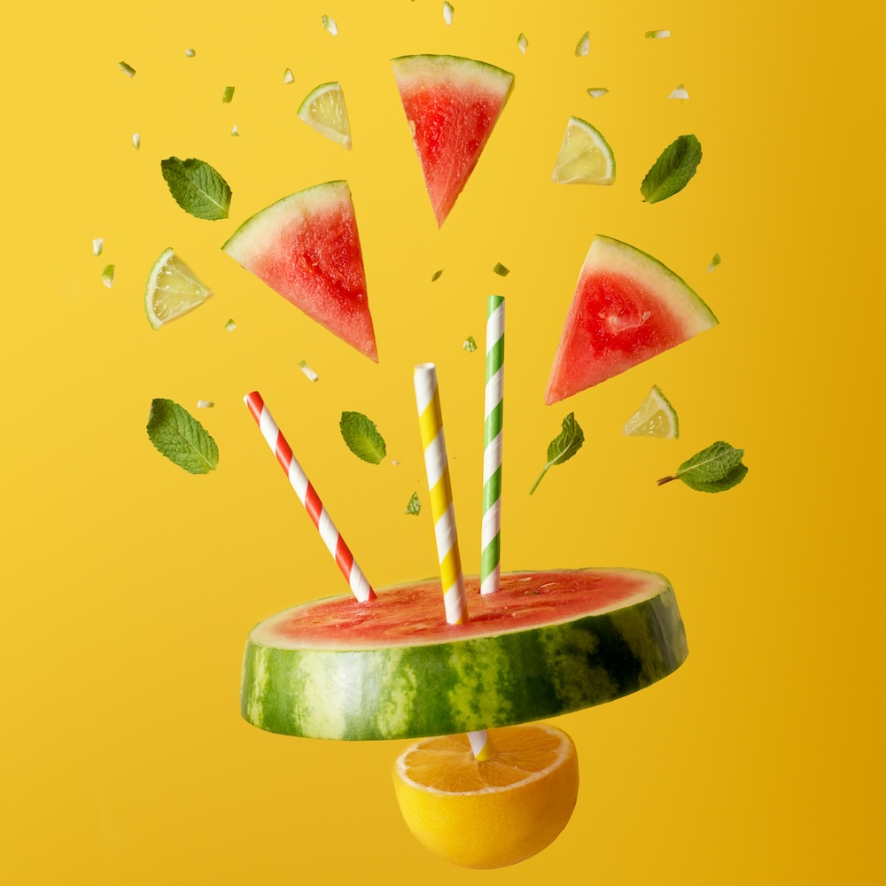 Explosion of watermelon on a vibrant orange background - Reclaim your health - Health & Wellbeing packages from Nutrition with Nina