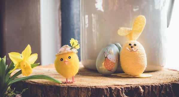 3 yellow Easter chicks on a table